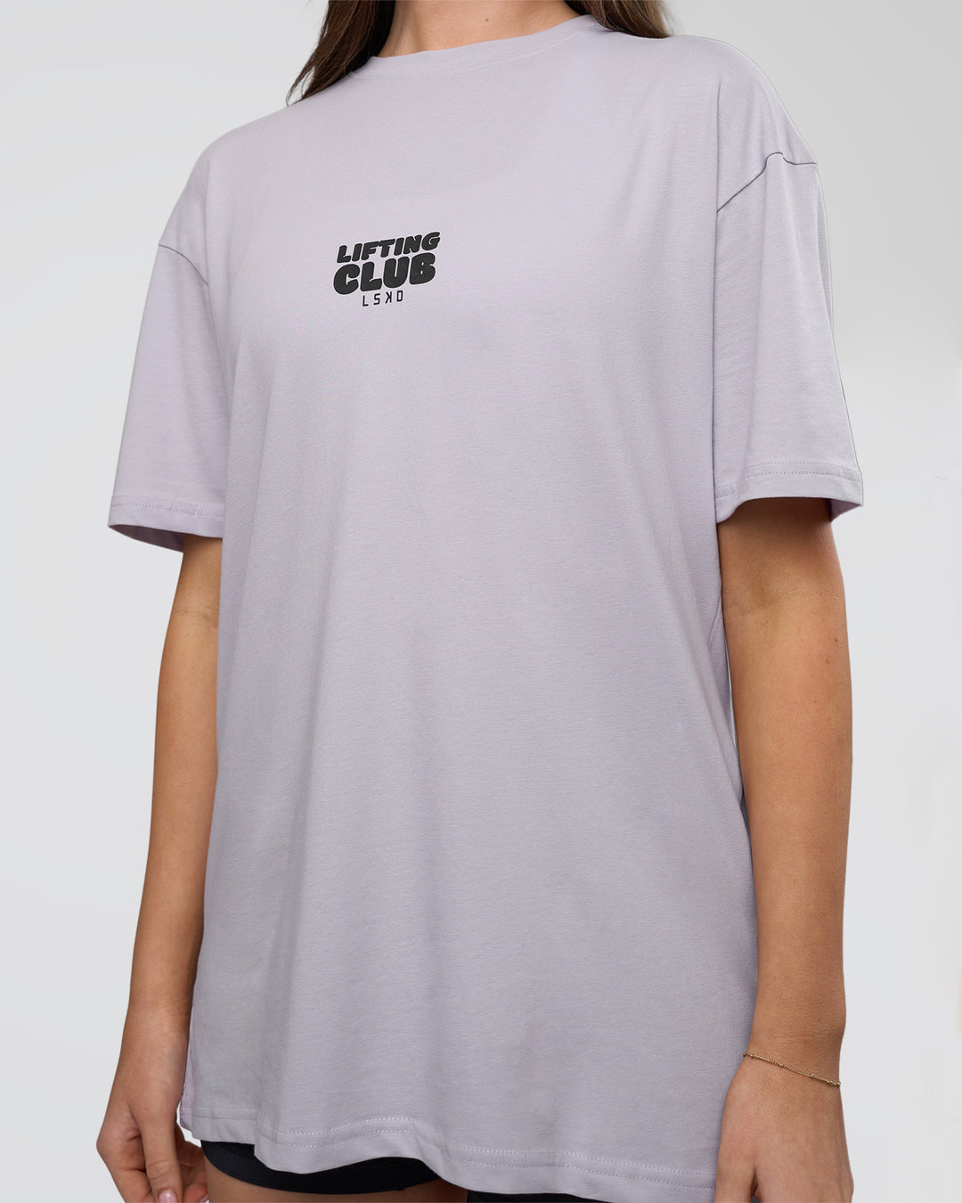 Woman wearing Kettle B FLXCotton Oversized Tee - Galactic Lilac-Black | Model:Estella | Size:XS