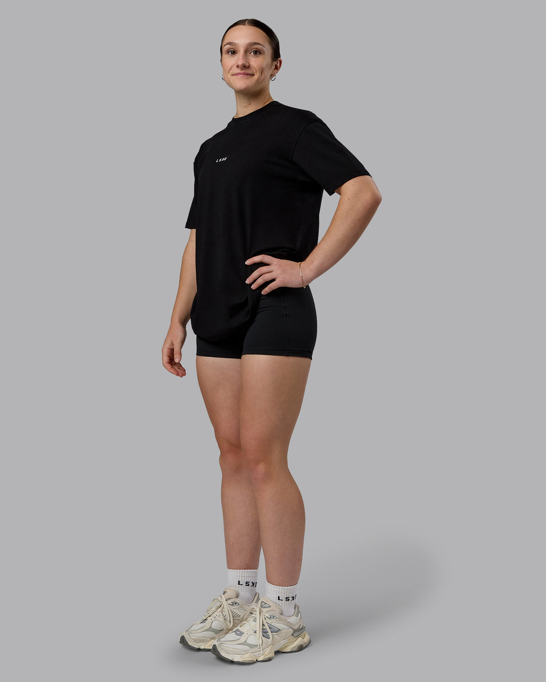 Woman wearing Kettlebell Oversized Tee - Black-White | Model:Sav | Size:XS