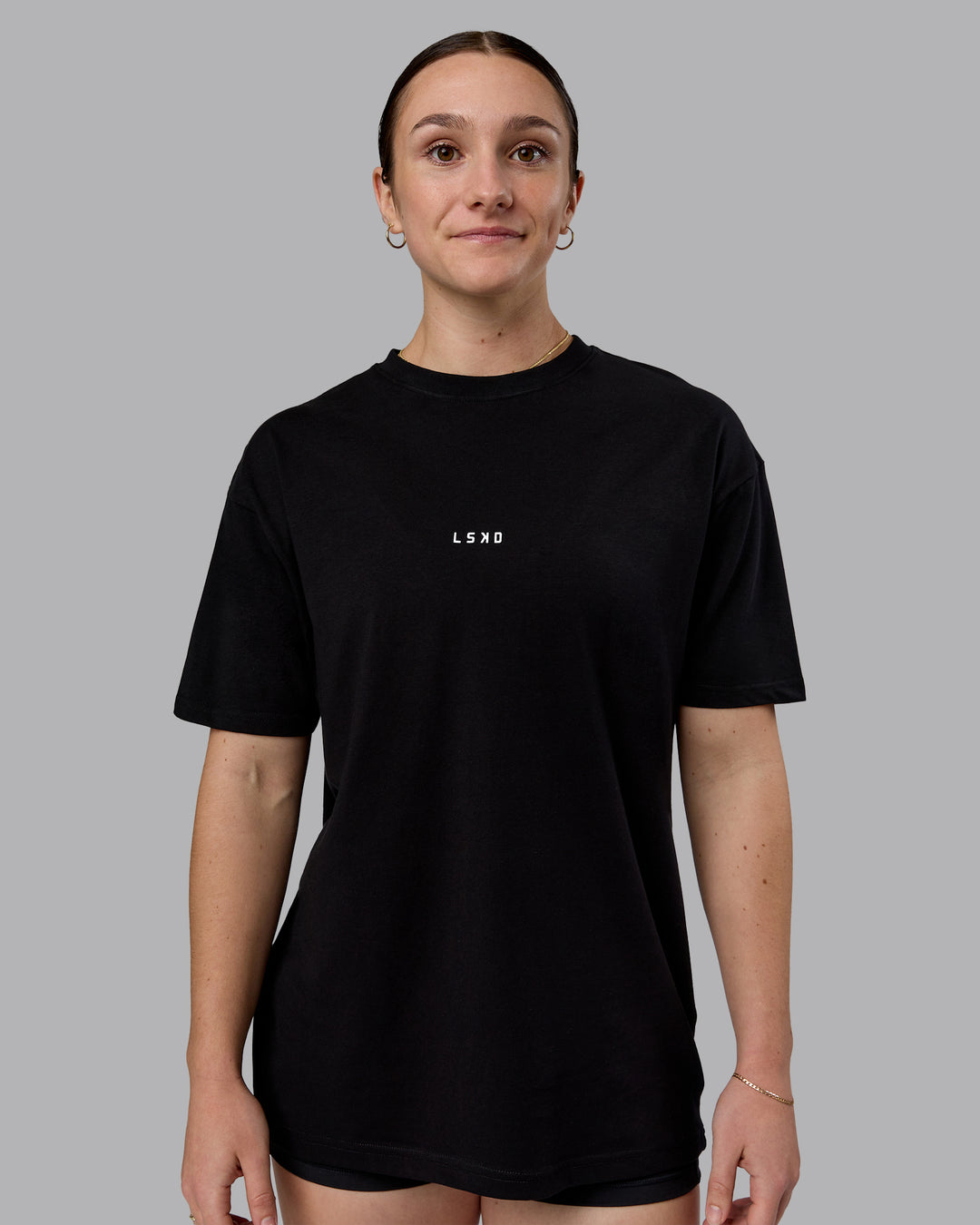 Woman wearing Kettlebell Oversized Tee - Black-White | Model:Sav | Size:XS