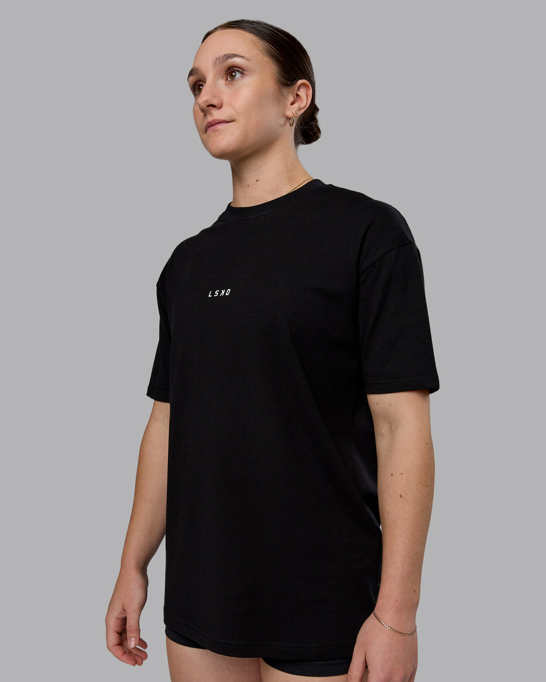 Woman wearing Kettlebell Oversized Tee - Black-White | Model:Sav | Size:XS
