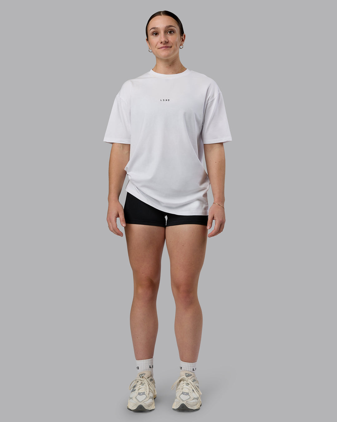 Woman wearing Kettlebell Oversized Tee - White-Black | Model:Sav | Size:XS