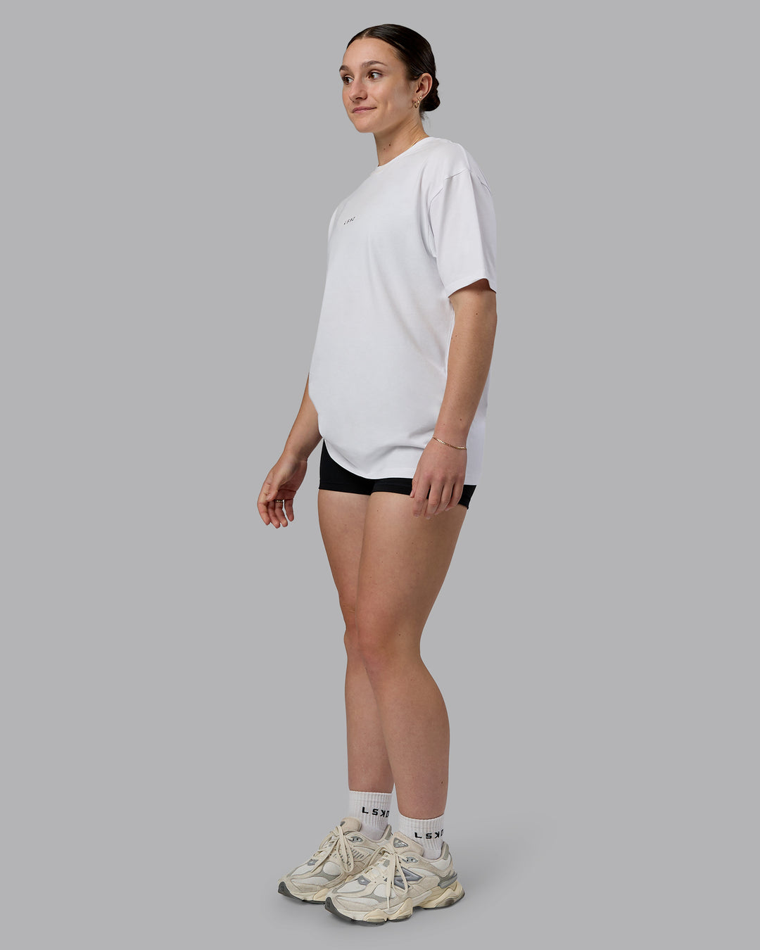 Woman wearing Kettlebell Oversized Tee - White-Black | Model:Sav | Size:XS