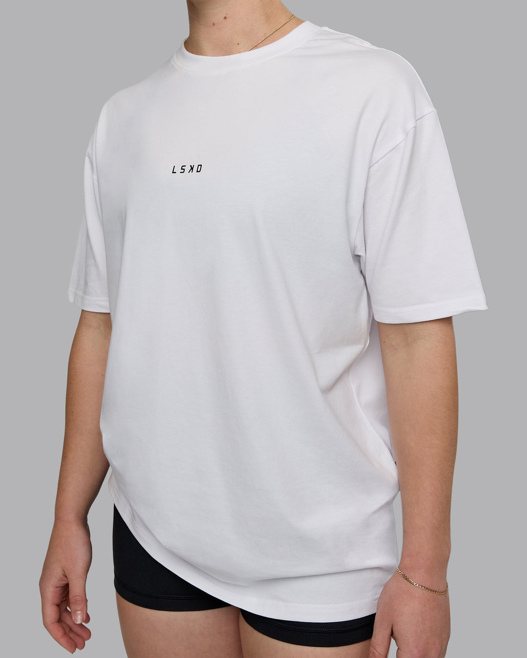 Woman wearing Kettlebell Oversized Tee - White-Black | Model:Sav | Size:XS