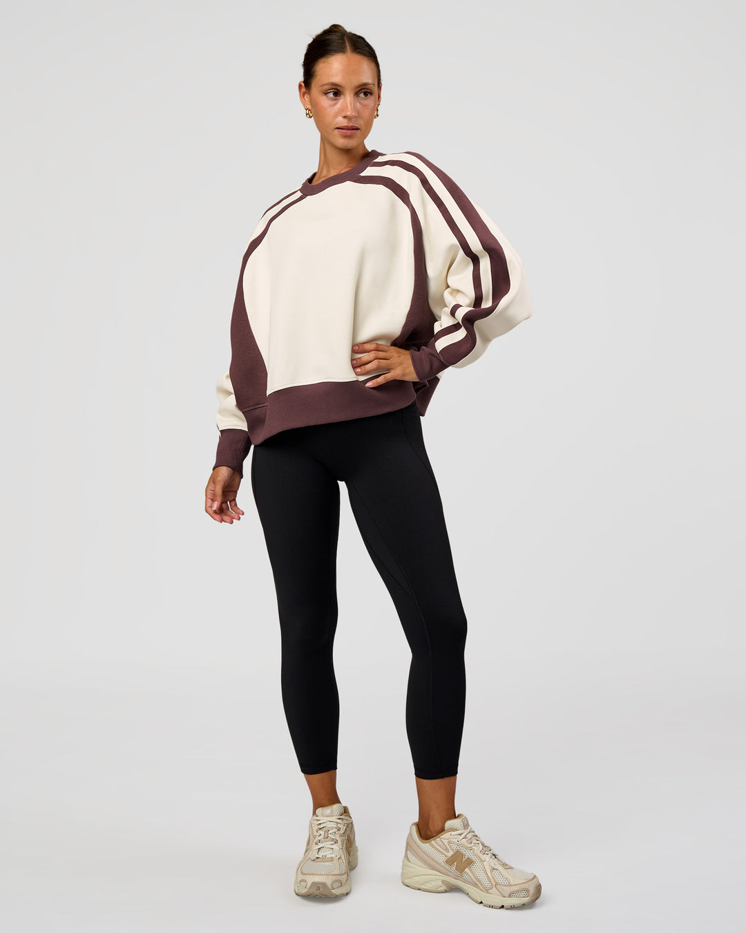 Woman wearing LSKD Fitness Club Oversized Sweater - Off White-Cocoa Powder | Model:Brylee | Size:XS