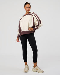 Woman wearing LSKD Fitness Club Oversized Sweater - Off White-Cocoa Powder | Model:Brylee | Size:XS