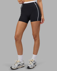 Woman wearing Liberate Contrast High-Rise 4" Short Pockets - Black-White | Model:Leilani | Size:XS | Thumbnail Index: 7
