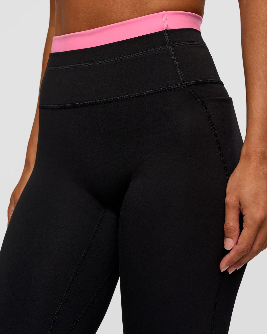Woman wearing Liberate High-Rise Full Length Legging Pockets - Black-Candy Pink | Model:Brylee | Size:XS