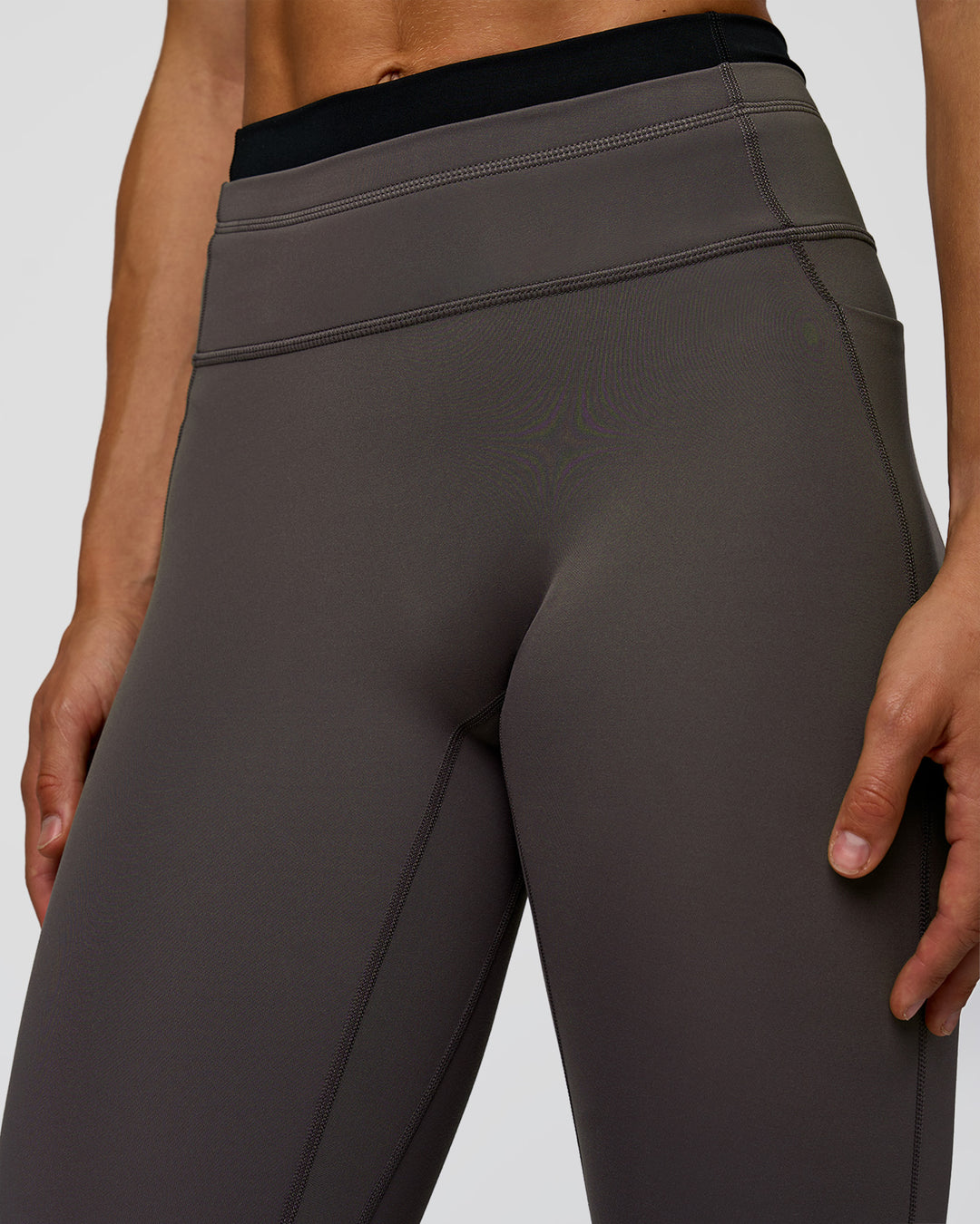 Woman wearing Liberate High-Rise Full Length Legging Pockets in Duskstone-Black | Model:Maja | Size:XS