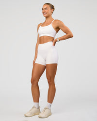 Woman wearing Lift Sports Bra - White | Model:Maja | Size:XS