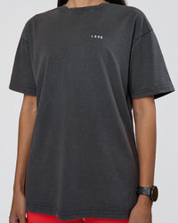 Woman wearing Lifting FLXCotton Oversized Tee - Black Washed-Flame | Model:Rhiley | Size:XS