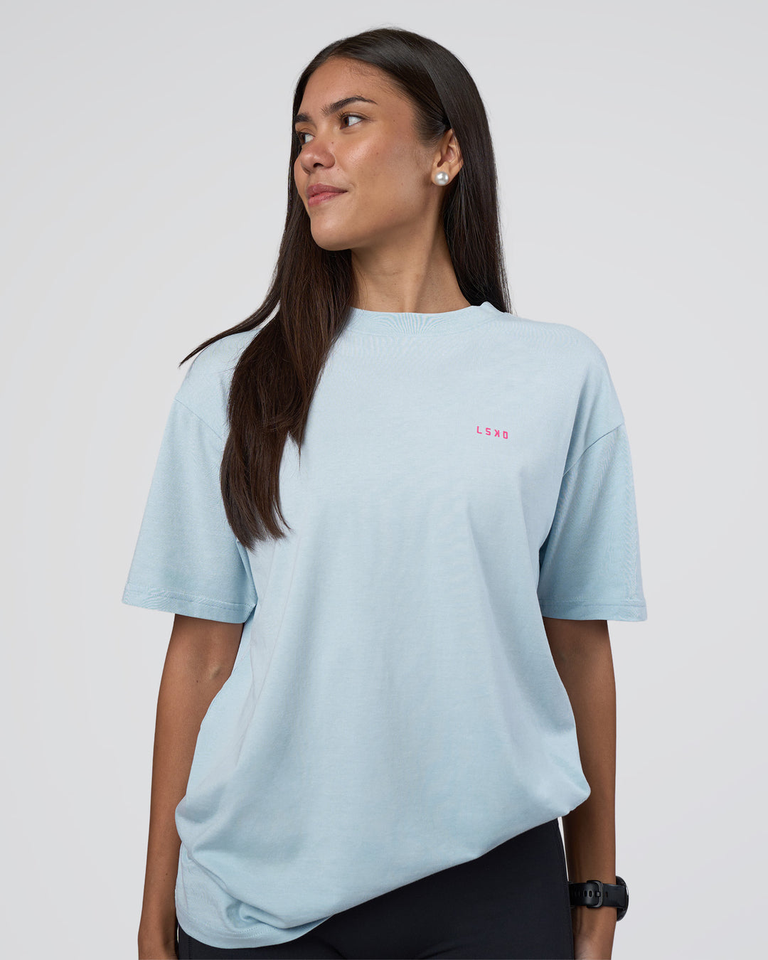 Woman wearing Lifting FLXCotton Oversized Tee - Blue Aura-Ultra Pink | Model:Rhiley | Size:XS