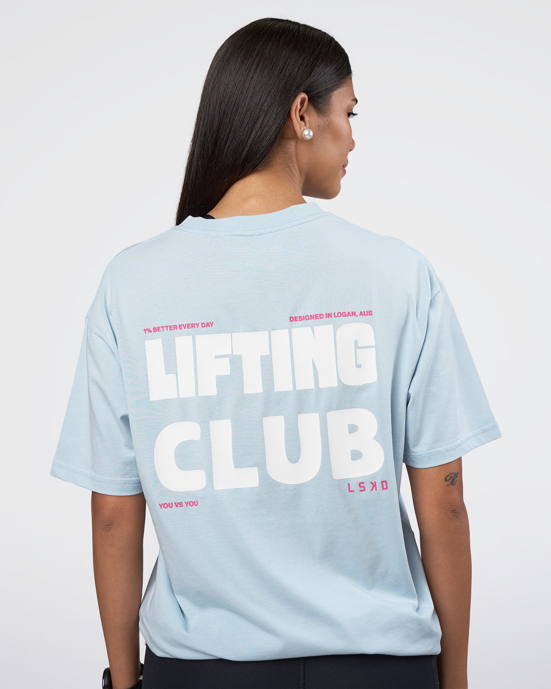 Woman wearing Lifting FLXCotton Oversized Tee - Blue Aura-Ultra Pink | Model:Rhiley | Size:XS