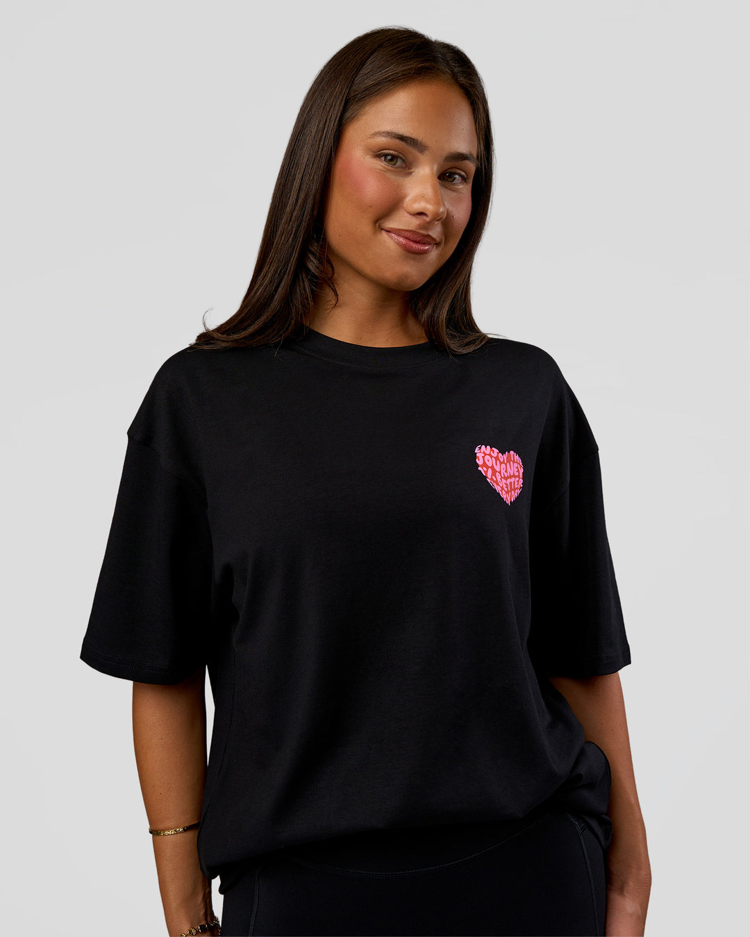 Woman wearing Love the Journey FLXCotton Oversized Tee - Black-Flame | Model:Bianca | Size:XS