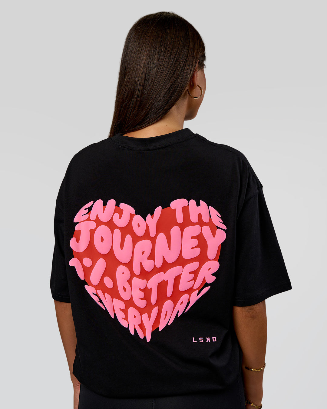 Woman wearing Love the Journey FLXCotton Oversized Tee - Black-Flame | Model:Bianca | Size:XS