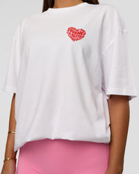 Woman wearing Love the Journey FLXCotton Oversized Tee - White-Candy Pink | Model:Bianca | Size:XS