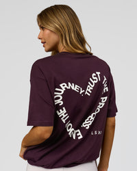 Woman wearing Love The Process FLXCotton Oversize Tee - Midnight Plum-White | Model:Leilani | Size:XS