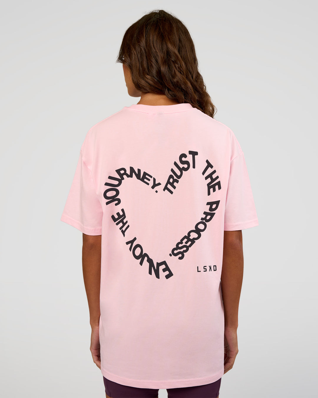 Woman wearing Love The Process FLXCotton Oversize Tee - Marshmallow-Midnight Plum | Model:Dakota | Size:XS