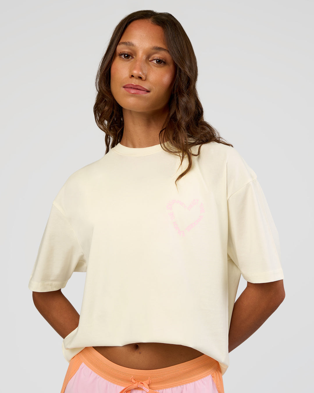 Woman wearing Love The Process FLXCotton Oversize Tee - Off White-Marshmallow | Model:Dakota | Size:XS