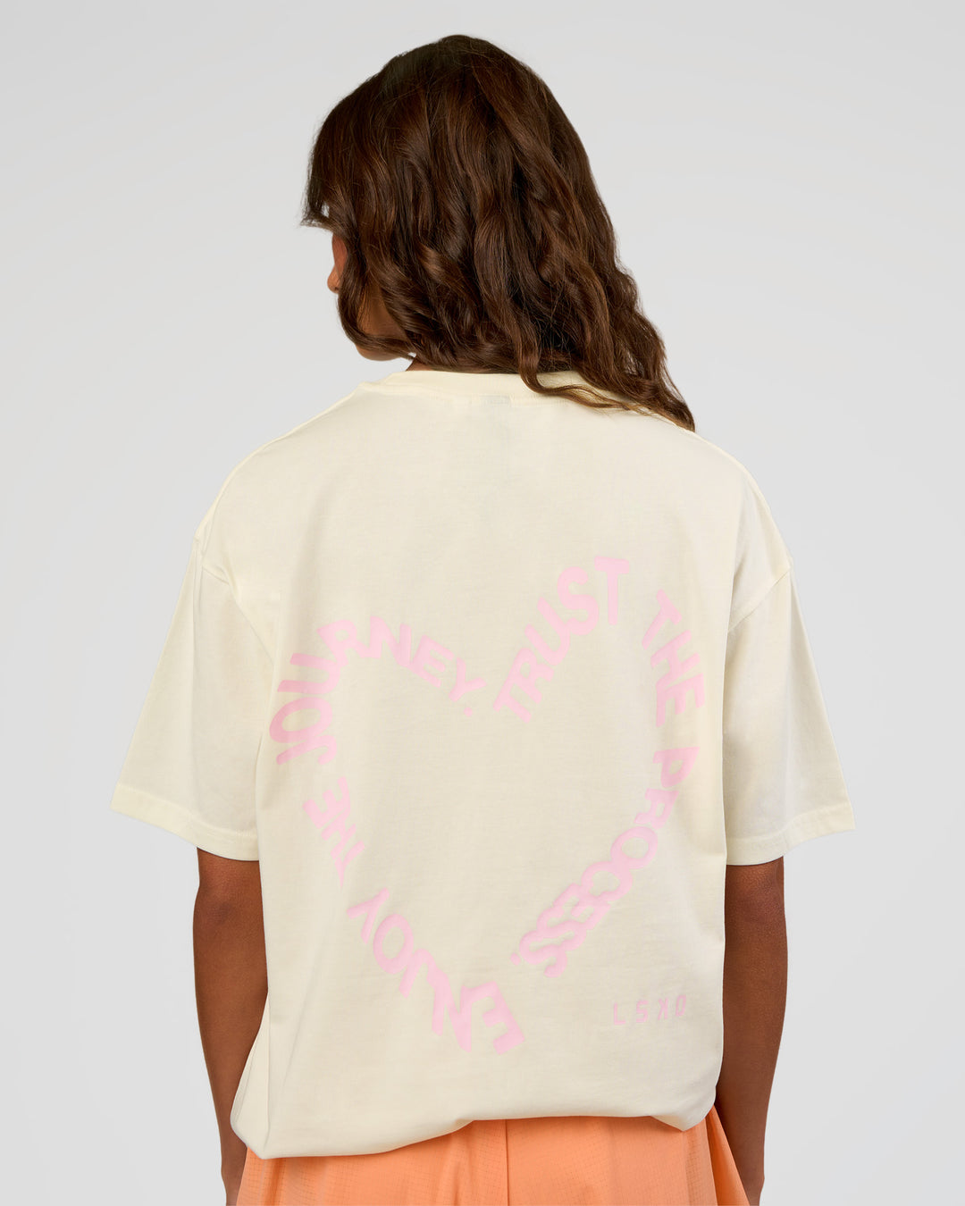 Woman wearing Love The Process FLXCotton Oversize Tee - Off White-Marshmallow | Model:Dakota | Size:XS