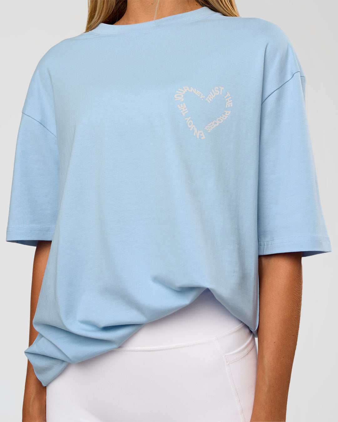 Woman wearing Love The Process FLXCotton Oversize Tee - Open Air-Off White | Model:Georgia | Size:XS