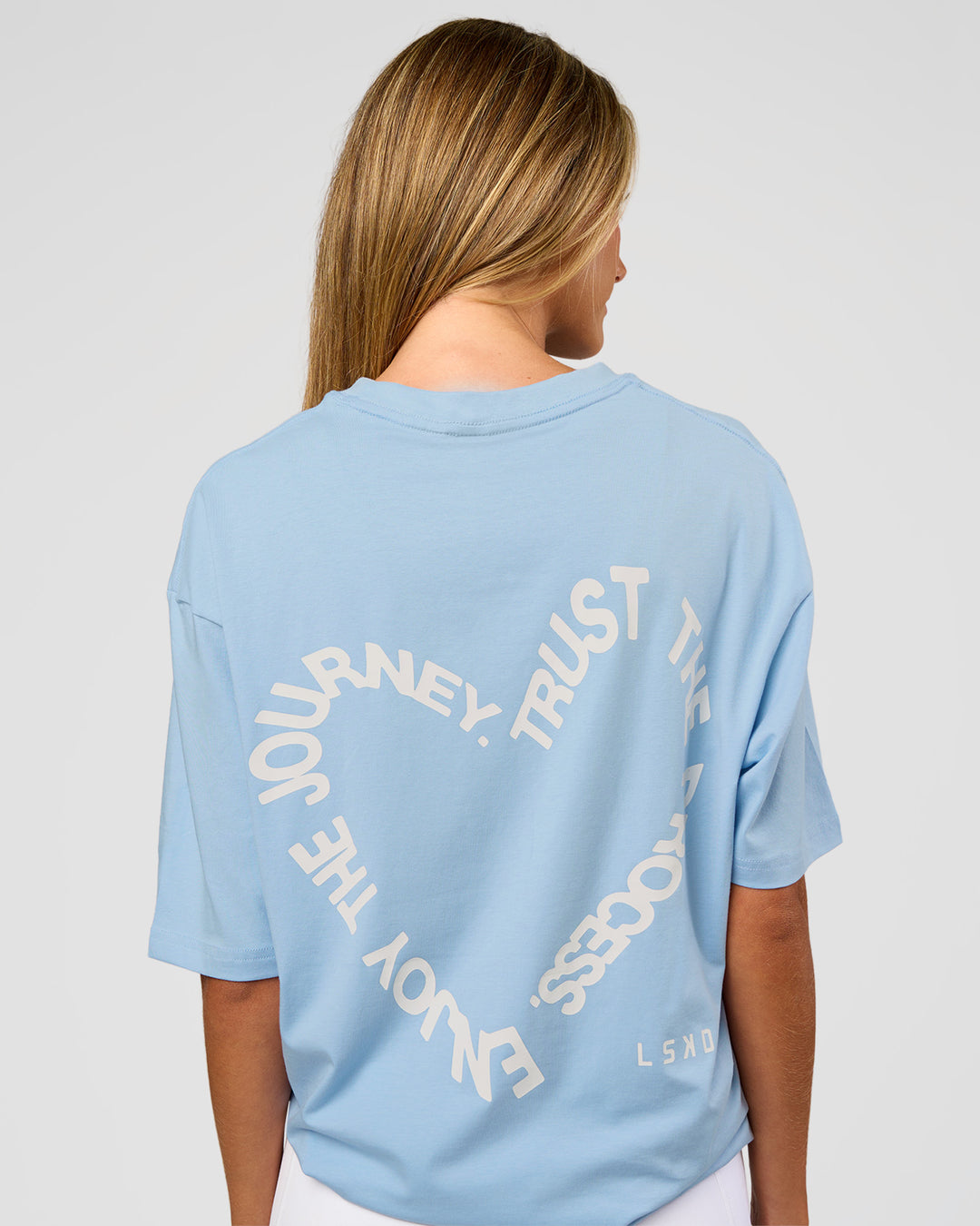 Woman wearing Love The Process FLXCotton Oversize Tee - Open Air-Off White | Model:Georgia | Size:XS