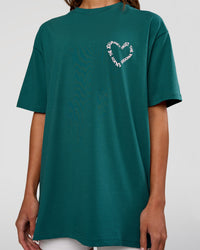Woman wearing Love The Process FLXCotton Oversize Tee - Transformative Teal-Marshmallow | Model:Dakota | Size:XS