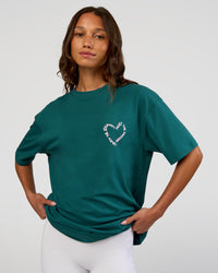 Woman wearing Love The Process FLXCotton Oversize Tee - Transformative Teal-Marshmallow | Model:Dakota | Size:XS
