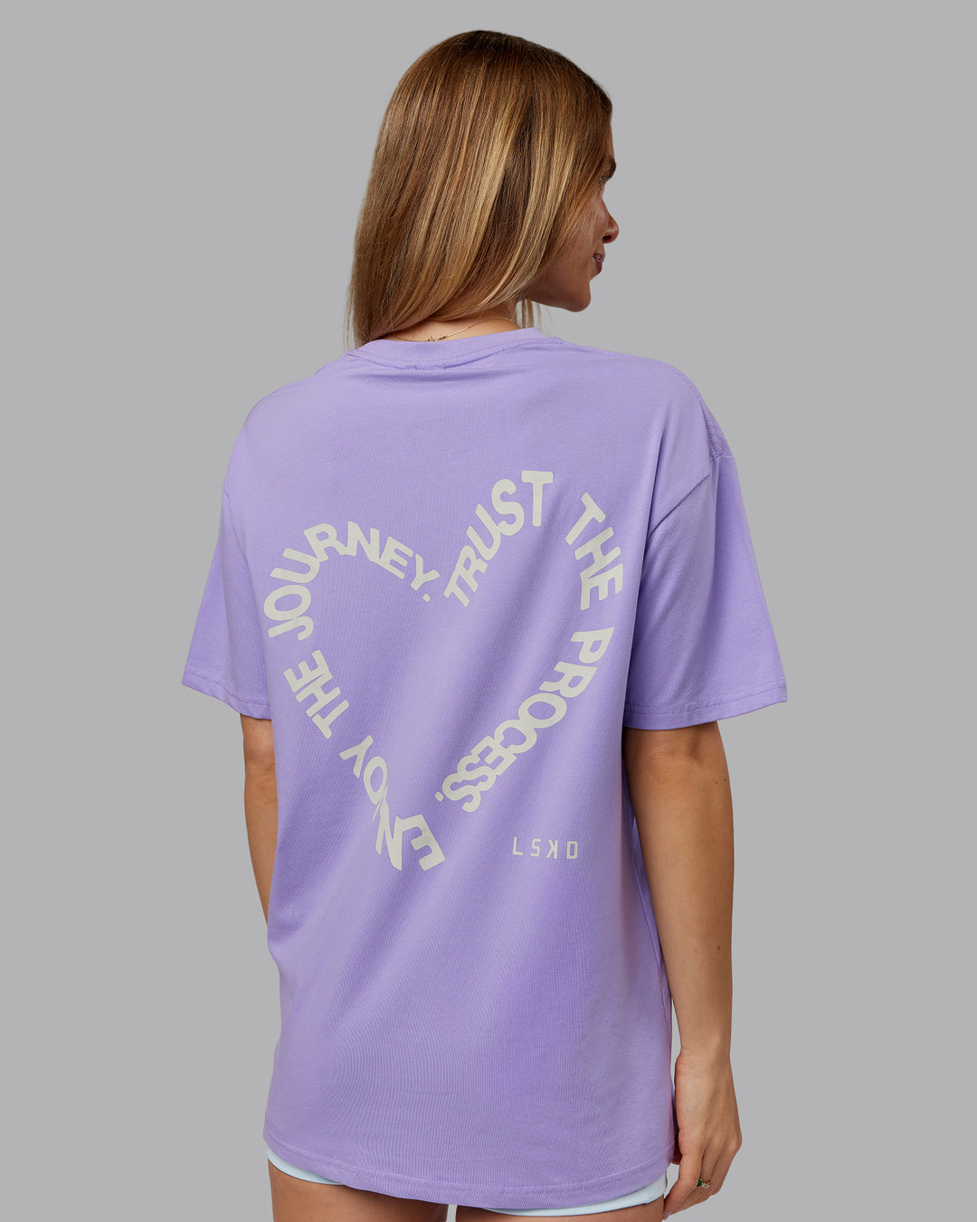 Woman wearing Love The Process FLXCotton Oversize Tee - Violet Ray-Bone | Model:Emilie | Size:XS