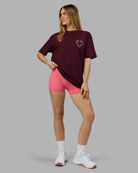 Woman wearing Love The Process FLXCotton Oversize Tee - Cherry Lacquer-Shale Beige | Model:Emilie | Size:XS