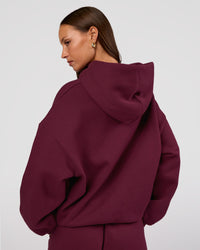 Woman wearing MVP Oversized Hoodie - Cherry Lacquer | Model:Brylee | Size:XS