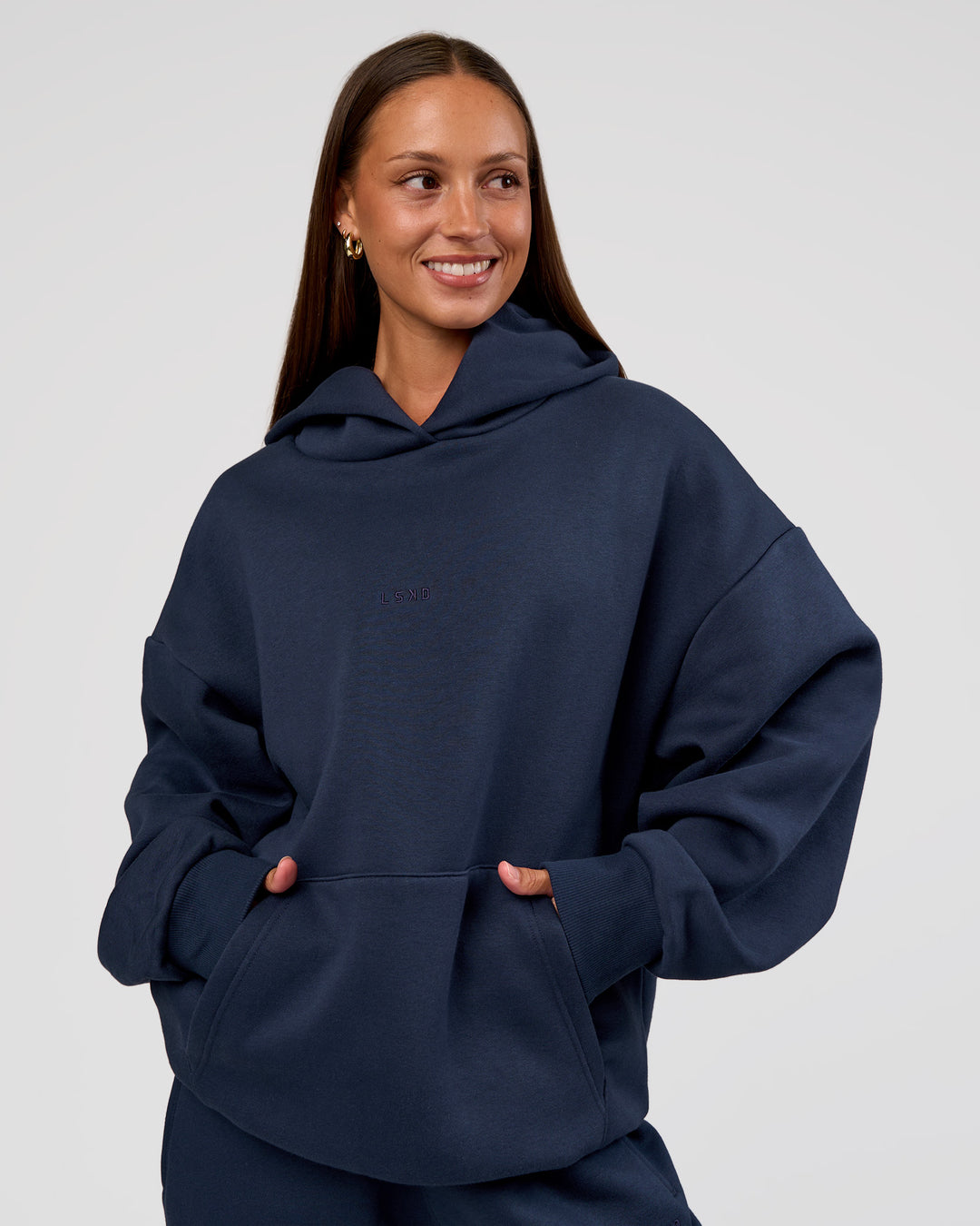 Woman wearing MVP Oversized Hoodie - Future Navy | Model:Brylee | Size:XS