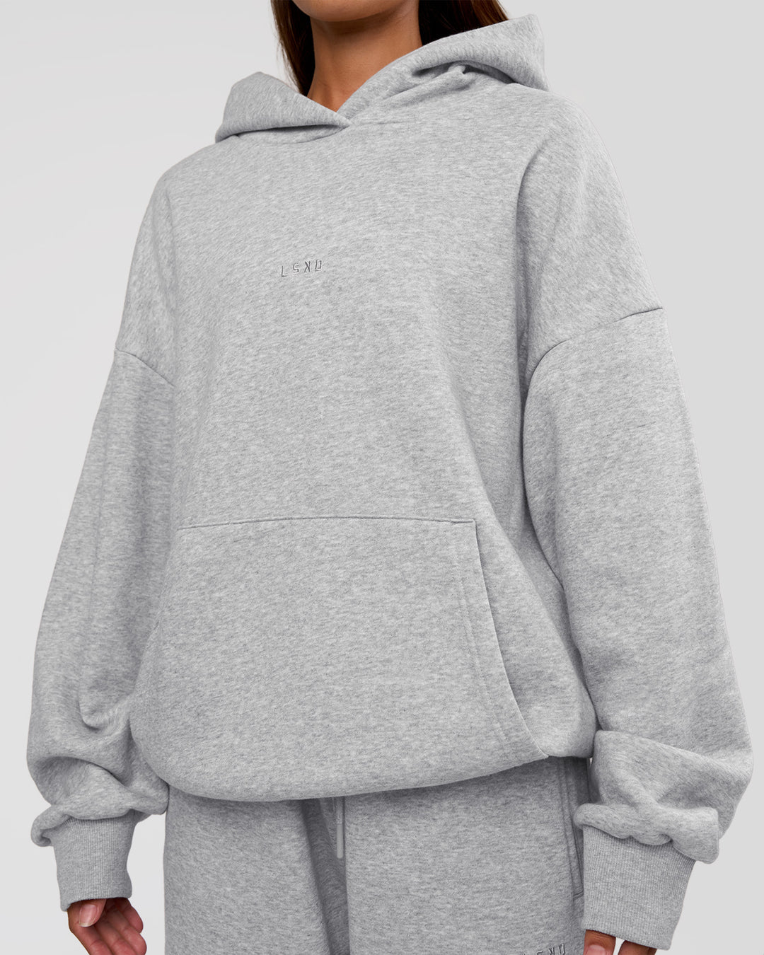 Woman wearing MVP Oversized Hoodie - Light Grey Marl | Model:Brylee | Size:XS