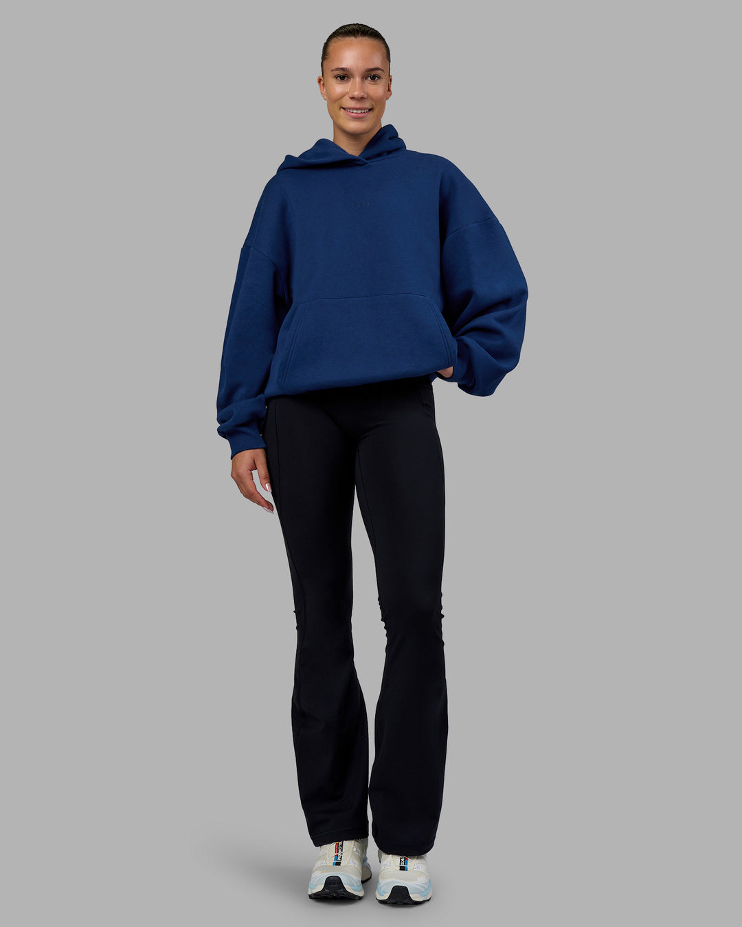 Woman wearing MVP Oversized Hoodie - Midnight Blue | Model:Charlize | Size:XS