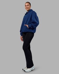 Woman wearing MVP Oversized Hoodie - Midnight Blue | Model:Charlize | Size:XS