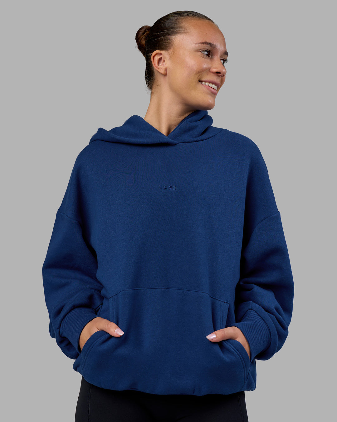 Woman wearing MVP Oversized Hoodie - Midnight Blue | Model:Charlize | Size:XS