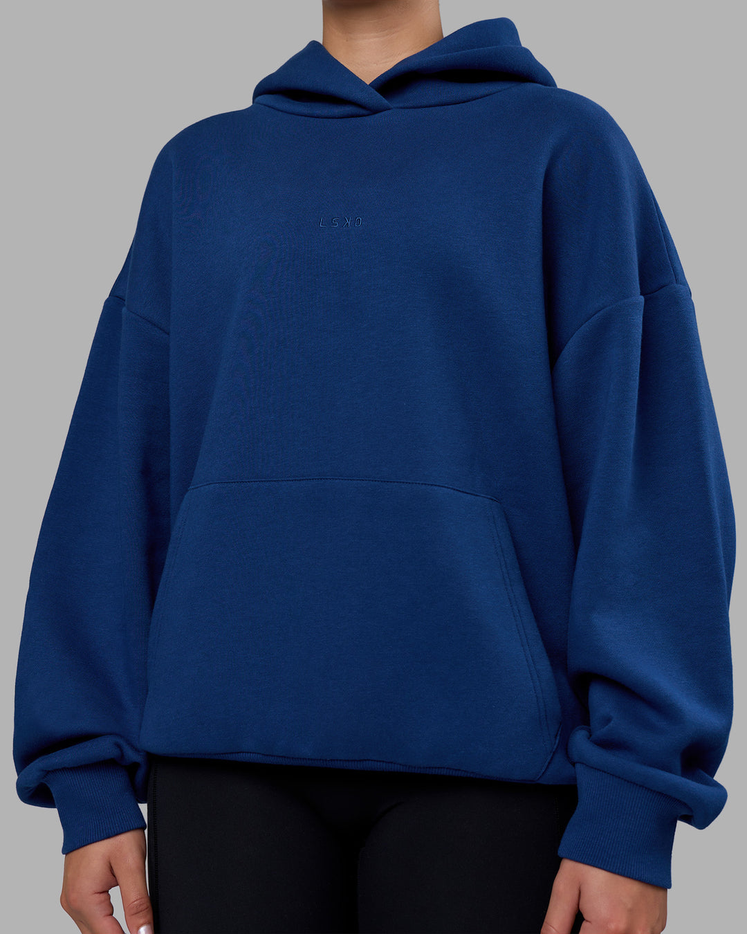 Woman wearing MVP Oversized Hoodie - Midnight Blue | Model:Charlize | Size:XS