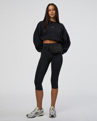Woman wearing MVP Oversized Sweater - Black-White | Model:Eliza | Size:XS