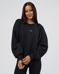 Woman wearing MVP Oversized Sweater - Black-White | Model:Eliza | Size:XS