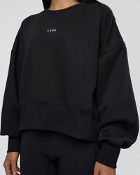 Woman wearing MVP Oversized Sweater - Black-White | Model:Eliza | Size:XS