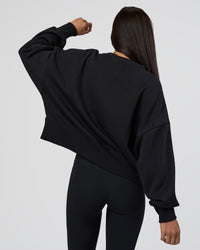 Woman wearing MVP Oversized Sweater - Black-White | Model:Eliza | Size:XS