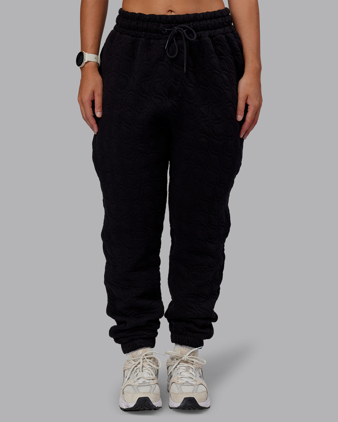 Woman wearing MVP Quilted Track Pant - Black-Geometric | Model:Lyss | SIze:XS