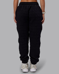 Woman wearing MVP Quilted Track Pant - Black-Geometric | Model:Lyss | SIze:XS