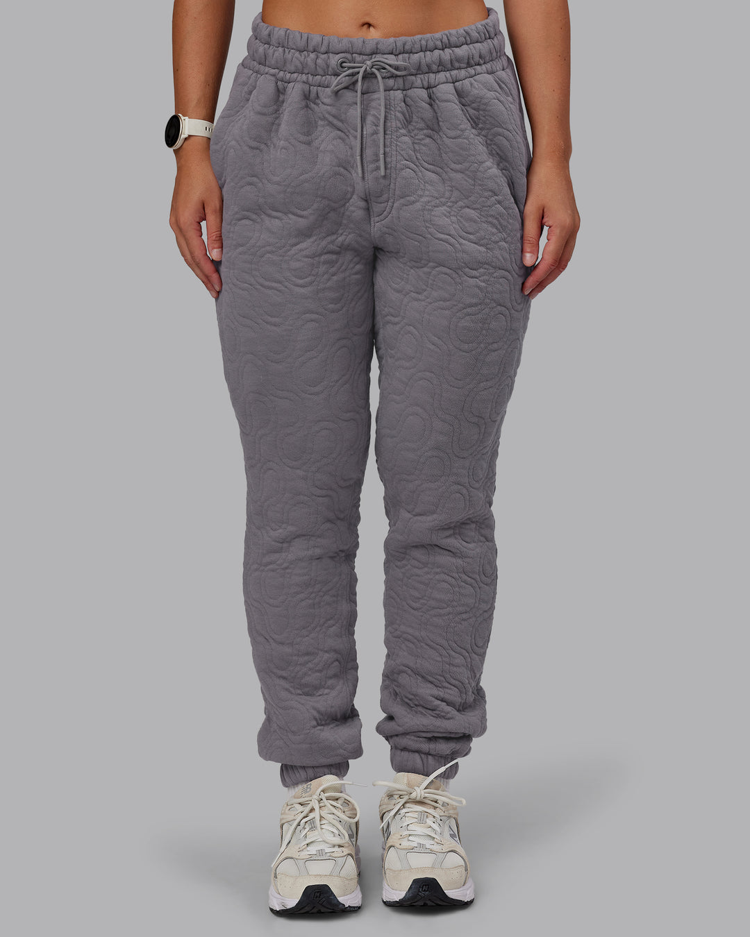 Woman wearing MVP Quilted Track Pant - Storm Front-Geometric | Model:Lyss | Size:XS