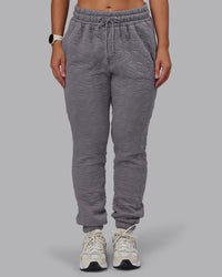 Woman wearing MVP Quilted Track Pant - Storm Front-Geometric | Model:Lyss | Size:XS