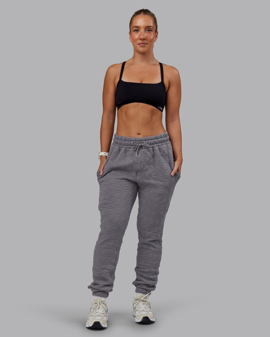 Woman wearing MVP Quilted Track Pant - Storm Front-Geometric | Model:Lyss | Size:XS