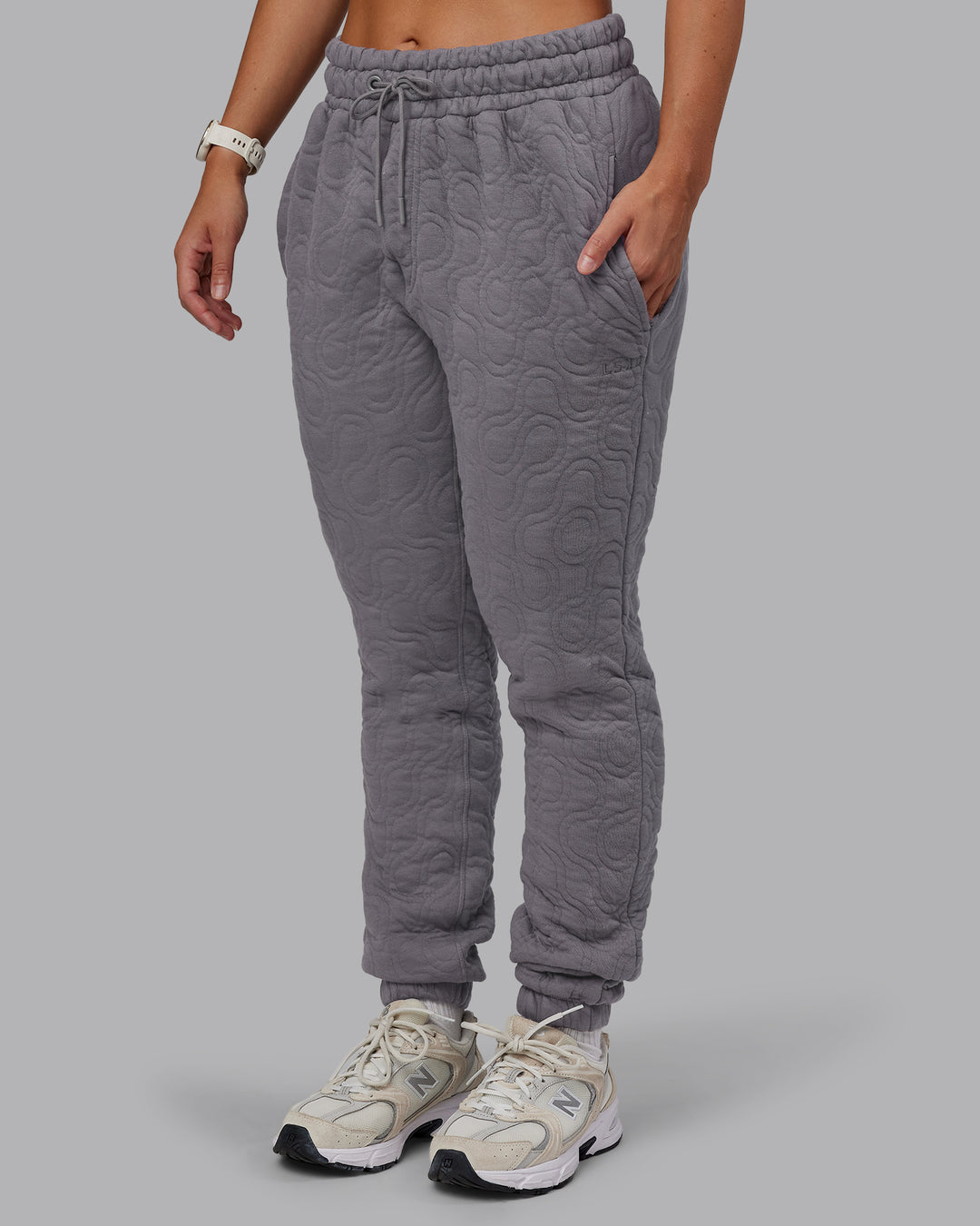 Woman wearing MVP Quilted Track Pant - Storm Front-Geometric | Model:Lyss | Size:XS