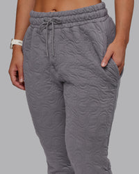 Woman wearing MVP Quilted Track Pant - Storm Front-Geometric | Model:Lyss | Size:XS