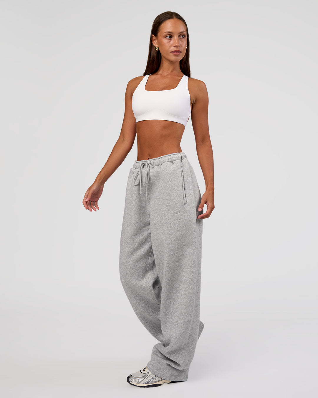 Woman wearing MVP Straight Leg Pant - Light Grey Marl | Model:Brylee | Size:XS