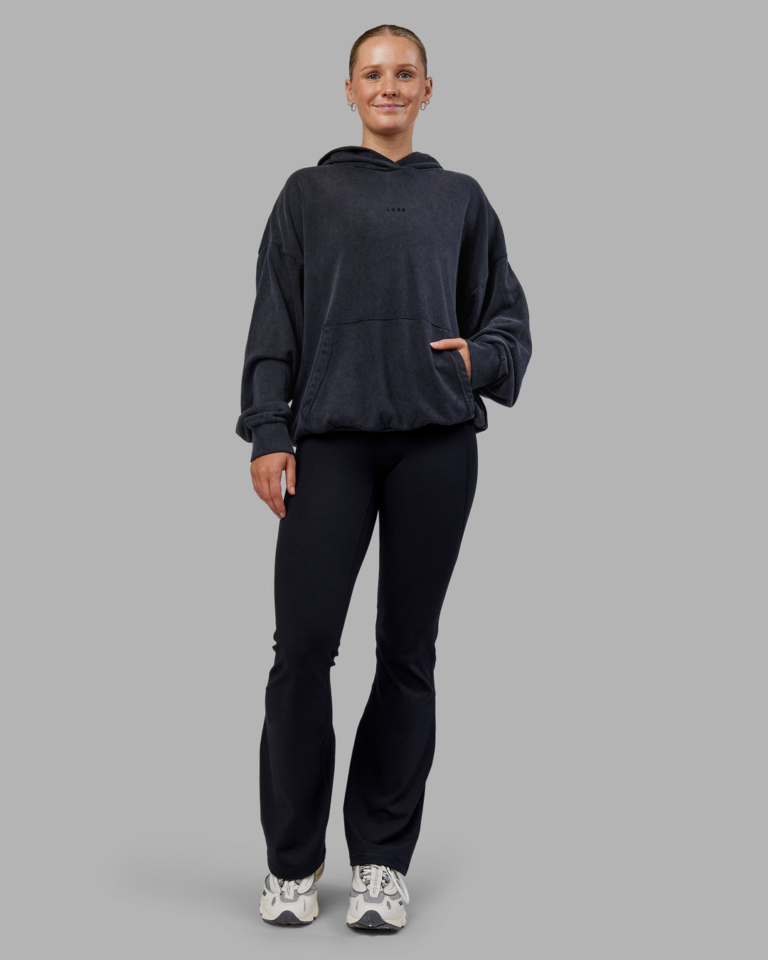 Woman wearing MVP Washed Terry Oversized Hoodie - Black Washed | Model:Neve | Size:XS