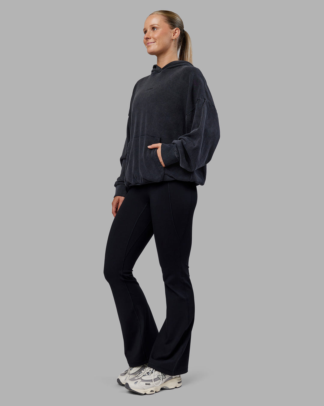 Woman wearing MVP Washed Terry Oversized Hoodie - Black Washed | Model:Neve | Size:XS